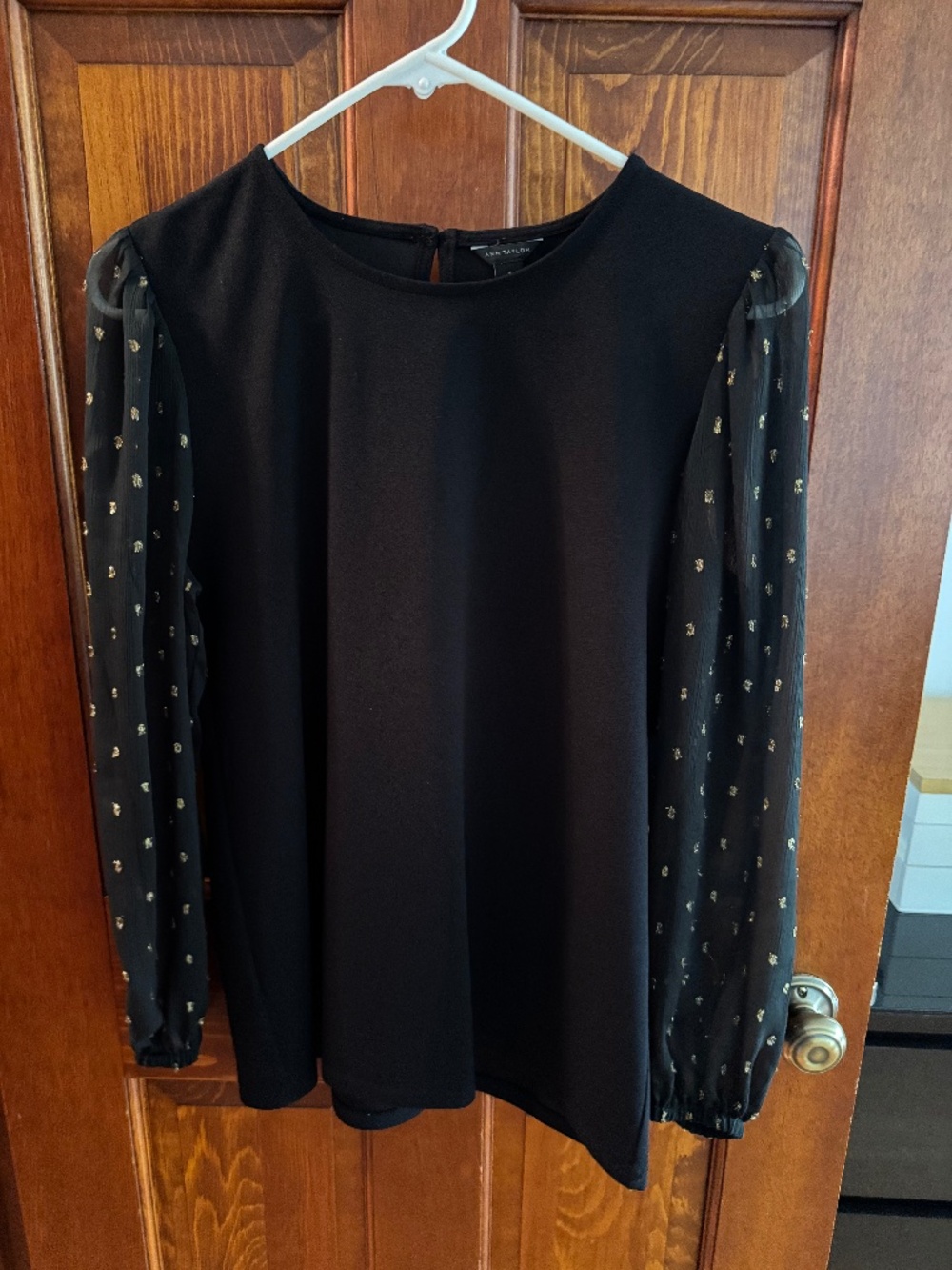 Ann Taylor black blouse with gold accent sleeves